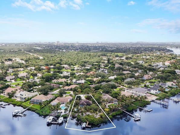18791 SE River Ridge Road - Listed by Illustrated Properties LLC (Jupiter) - Single Family — photo 1